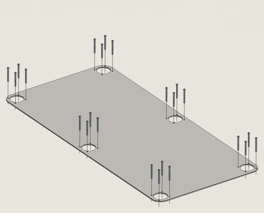 The Anchorage Bottom Plate lying flat with four M4x50 button head bolts standing up through the plate at each of the six tube positions.