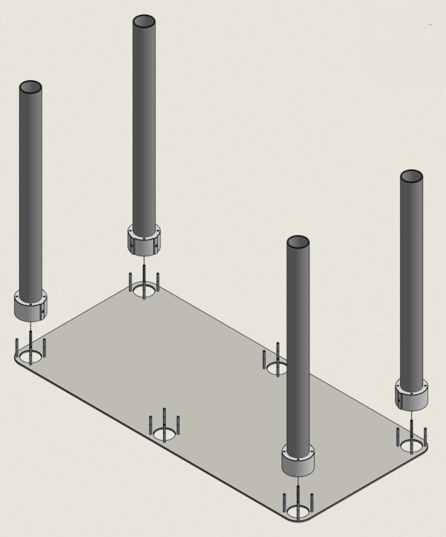 Four Corner Tubes standing on the bolts at the corners of the Bottom Plate, with the bolts at the two middle positions still empty.