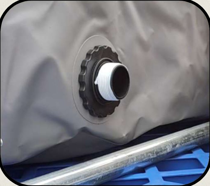 The drainage port seen from outside the tarp: a black threaded collar set into the grey PVC, with the white male thread pointing out of the Pool.